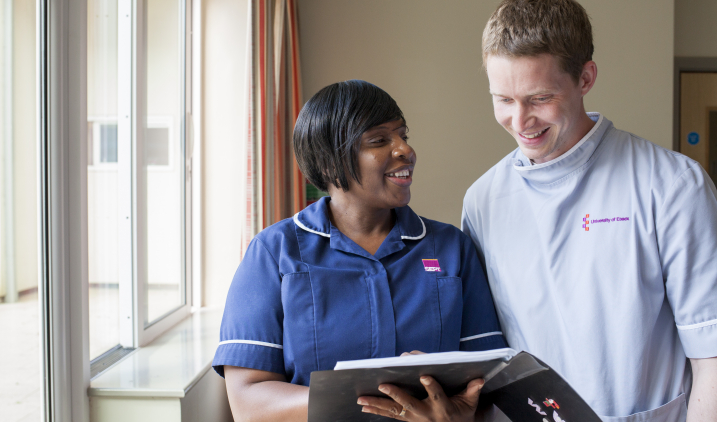 Female-nurse-with-male-student-nurse.jpeg